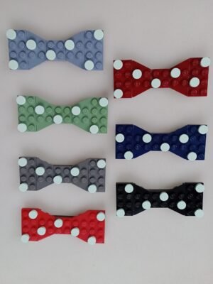 New Page Set of 7 Lego bow ties for children in different colours with light aqua dots