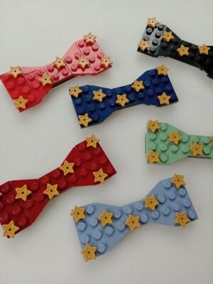 New Page Set of Lego bow ties for children in different colours with golden starts pattern