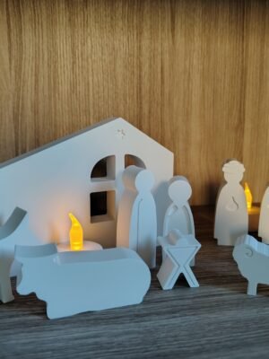 New Page Set of 11 white handmade concrete pieces of a nativity scene, with candles