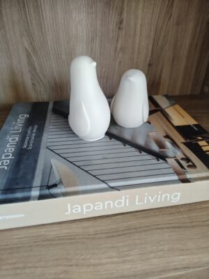 New Page 2 concrete white decorative penguins on a book